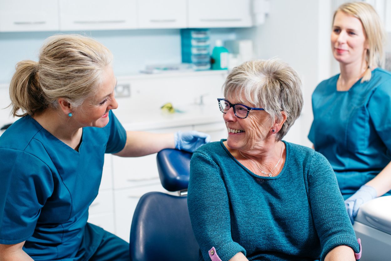 Dentist discussing denture options with a patient at Chalkwell Dental Practice